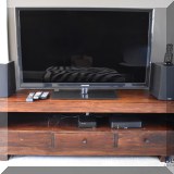 F21. Media console. 21”h x 64”w x 16”d (TV not for sale.) 